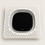 White Ecobee Premium contoured niche before installation, showing its perforated square mud-in flange and thermostat fit