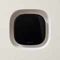 Ecobee Smart Thermostat Premium installed in a white contoured trimless drywall niche on a finished wall