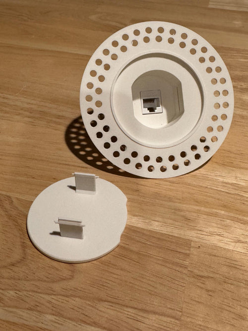 Round Cat6 wall niche with perforated mud-in flange and removable concealing lid