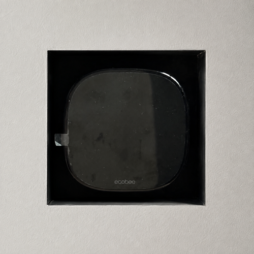 Ecobee Premium installed in a black trimless recessed drywall mount on a neutral wall