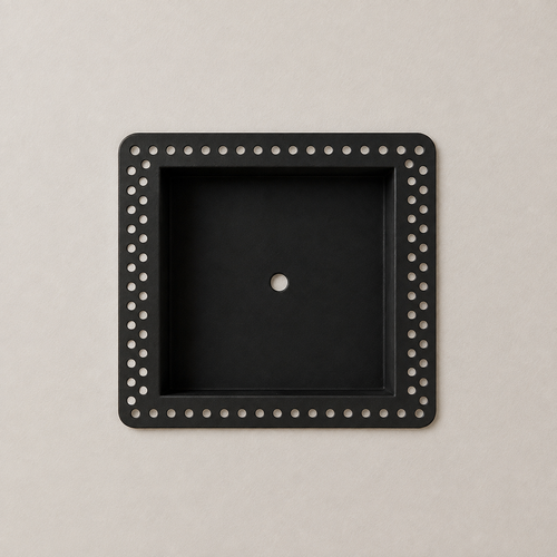 Empty black Ecobee Premium niche with a perforated mud-in flange on a neutral wall