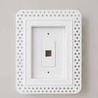 White trimless recessed low-voltage wall plate enclosure with perforated mud-in flange