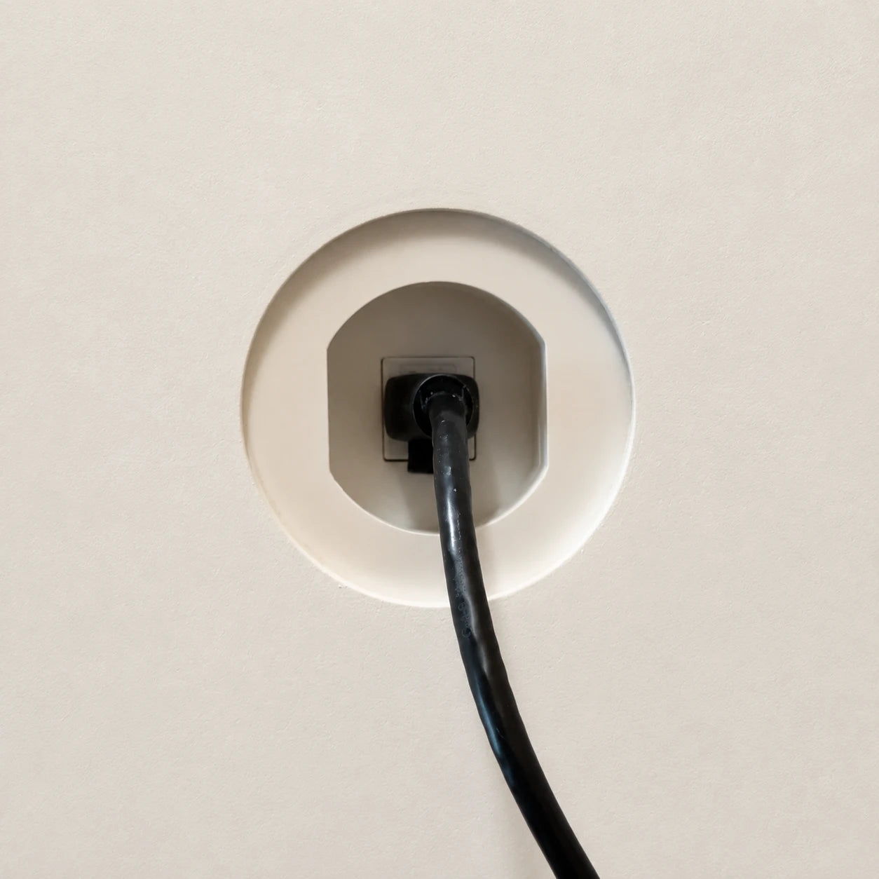 Cat6 Ethernet cable connected inside a trimless round wall niche